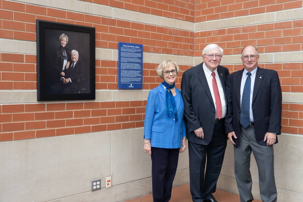 President Emeritus Arend and Nancy Lubbers with a guest at the Arend and Nancy Lubbers Student Services Center Dedication